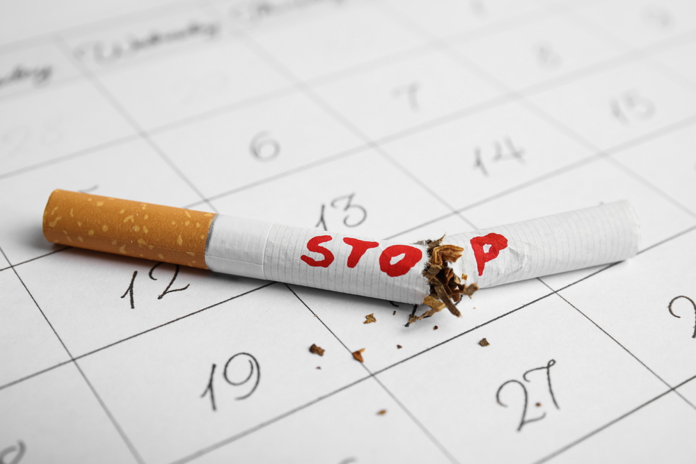Broken,Cigarette,With,Word,Stop,On,Calendar,Sheet.,Quitting,Smoking